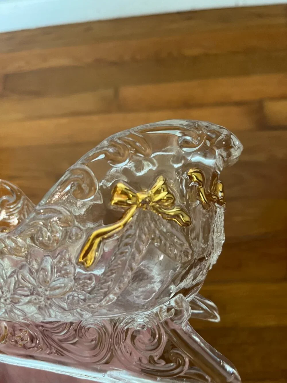 Glass sleigh with decorative gold-painted bows | Vintage